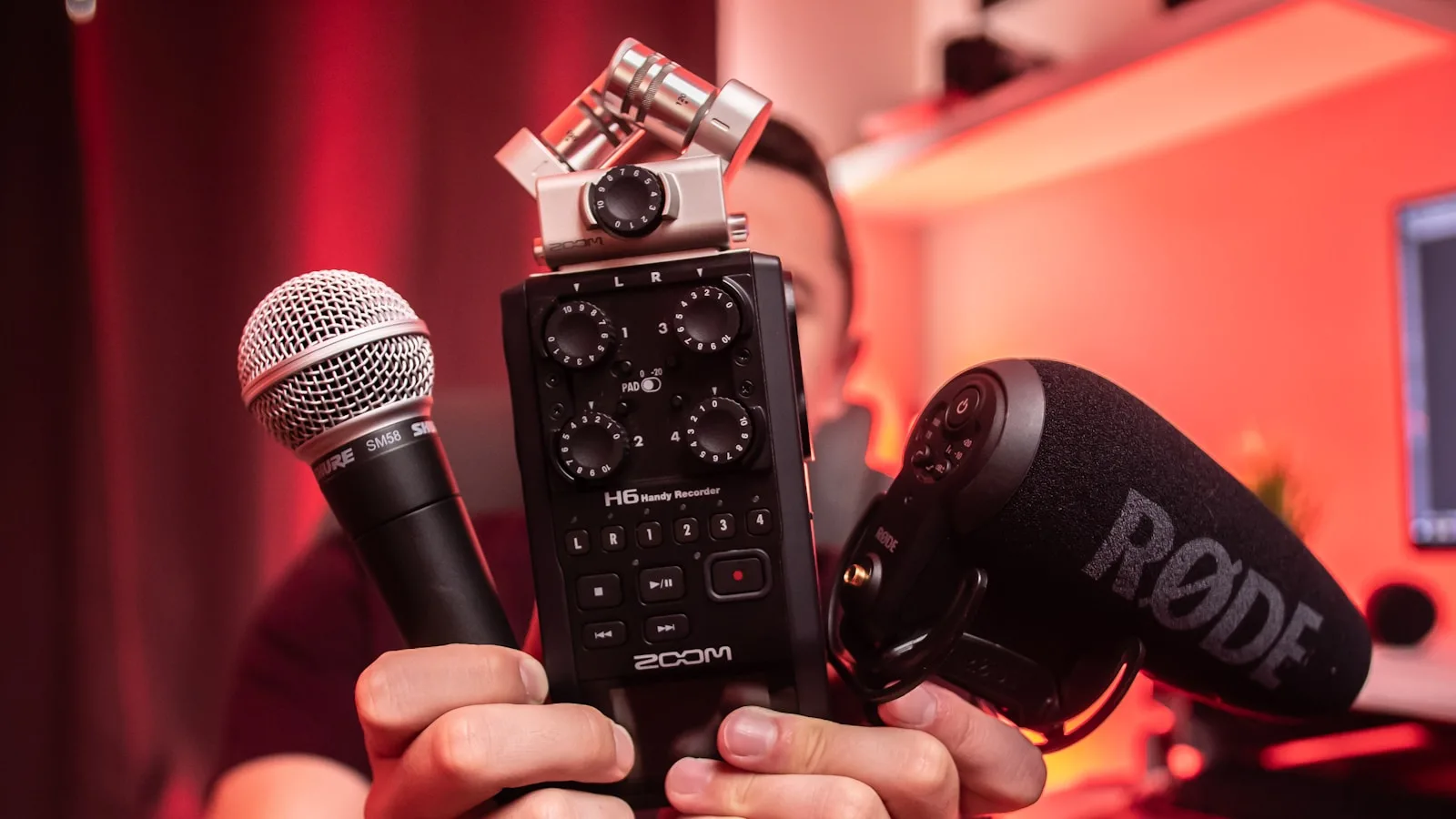 person holding microphones